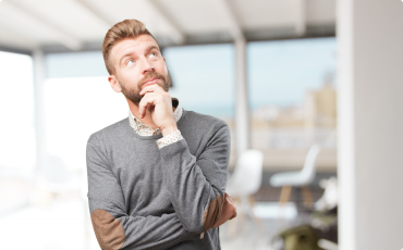 A man standing with a deep thought